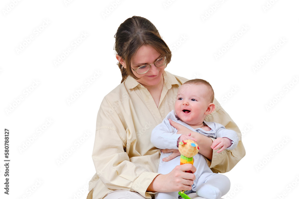 Happy woman mother playing with infant baby on home sofa in living room, isolated on a white background. Kid aged six months Happy woman mother playing with infant baby on home sofa in living room, isolated on a white background. Kid aged six months