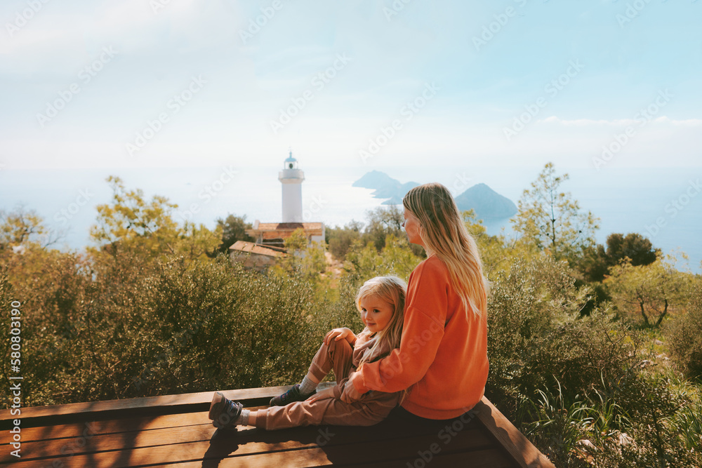 Mother and child traveling in Turkiye outdoor family summer vacations lifestyle hiking Lycian way Gelidonya lighthouse landscape - obrazy, fototapety, plakaty 