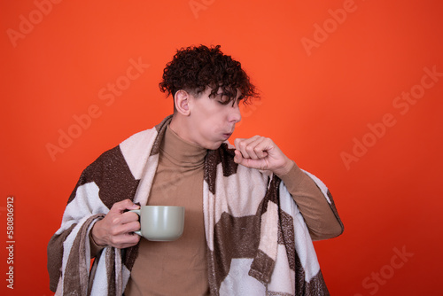 Illness and health problems. A young guy and a cold.