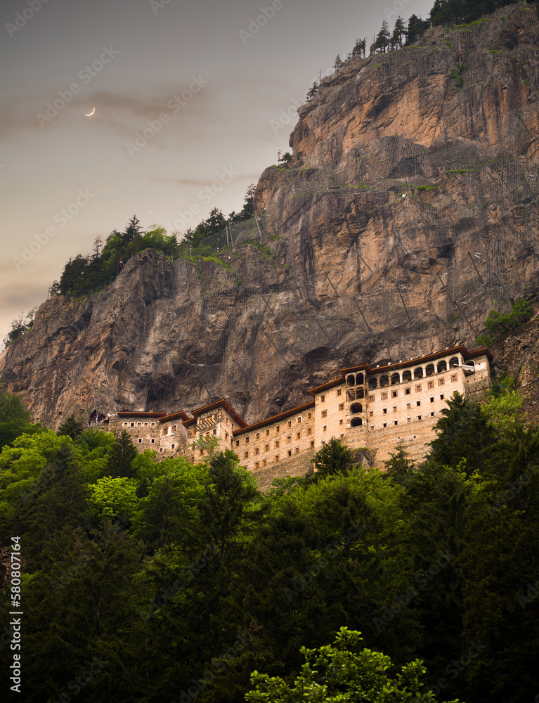 Historical Sumela Monastery at sunset. It is a Greek Orthodox monastery and church complex. Historical and touristic places of Turkey. Macka district, Trabzon