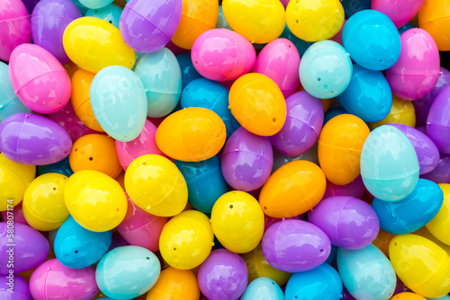 Box full of colorfull easter egg treats for children for egg hunting