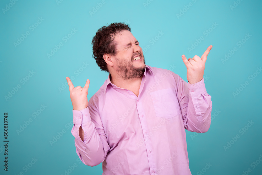 Funny young man surprised by his work. Funny young man surprised by his work.