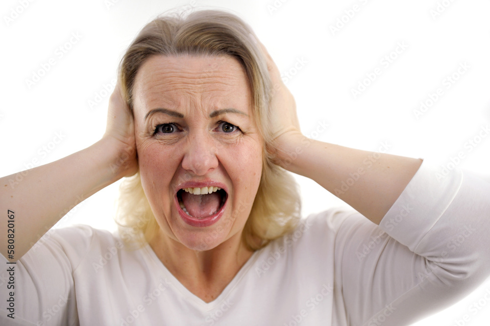 loud music strong sound headache woman closed her ears screaming with mouth wide open I do not want to hear it unwillingness to listen psychological work with a person against his will loud music strong sound headache woman closed her ears screaming with mouth wide open I do not want to hear it unwillingness to listen psychological work with a person against his will