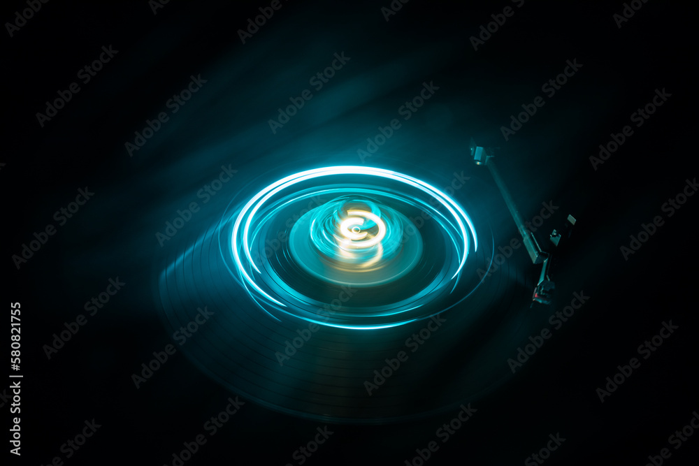 Music Dj concept. Trail of fire and smoke on vinyl record. Burning vinyl disk. Turntable vinyl record play Selective focus Music Dj concept. Trail of fire and smoke on vinyl record. Burning vinyl disk. Turntable vinyl record play Selective focus