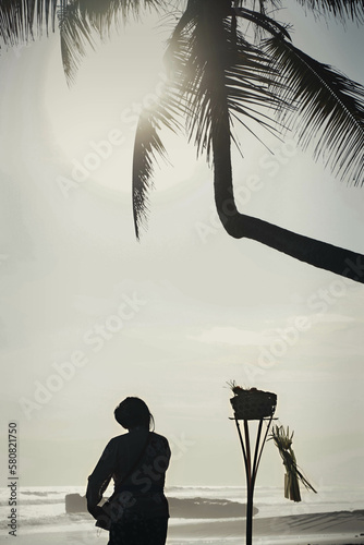 Balinese Offerings at Pasut Beach in Bali, Indonesia (Canang sari) photo