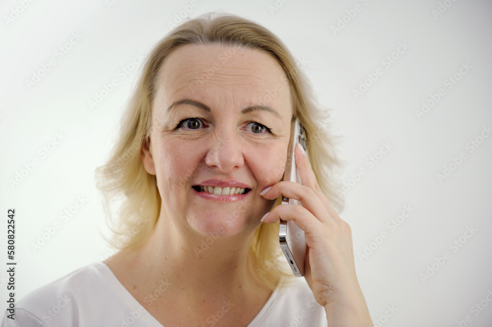 unexpected surprise woman talking on phone unpleasant smile open eyes wide something went wrong strange news gossip unexpected surprise woman talking on phone unpleasant smile open eyes wide something went wrong strange news gossip