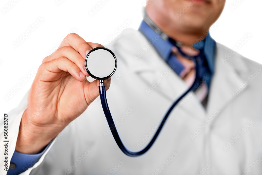 Young man doctor holding stetoscpoe isolated on white background Young man doctor holding stetoscpoe isolated on white background