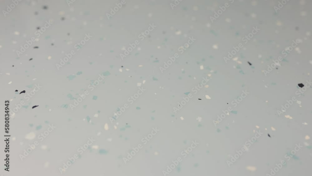 Epoxy non-slip gray flooring system decorated with chips Epoxy non-slip gray flooring system decorated with chips