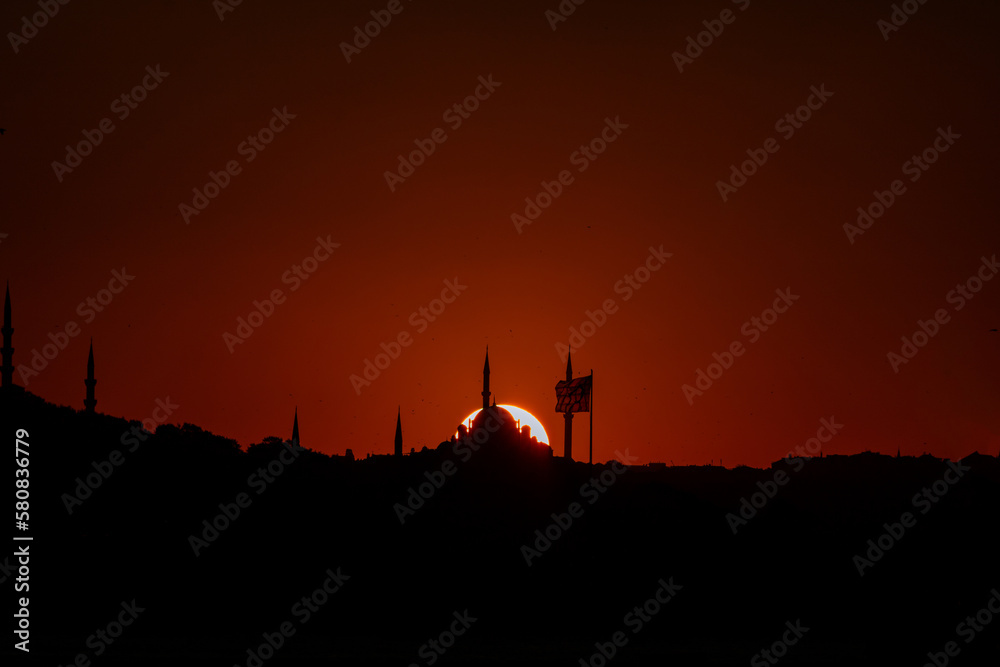 Silhouette of Fatih Mosque at sunset. Islamic or Ramadan background photo