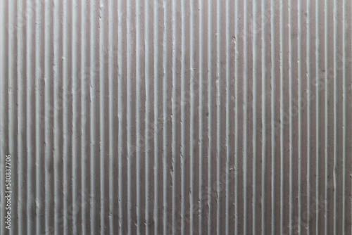 The background of the cement wall, wavy shapes, small grooves, dark white
