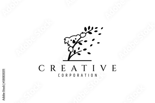 koala logo on a tree branch full of leaves in flat design style