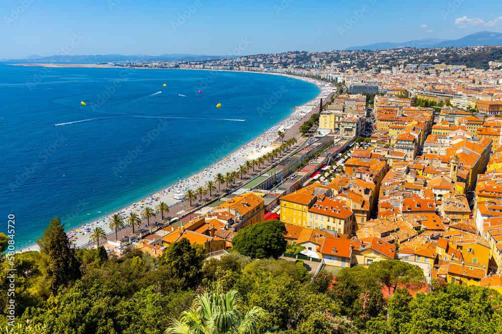 Nice panorama with Vieille Ville old town district, Promenade des Anglais boulevard and beach at French Riviera of Mediterranean Sea in France Nice panorama with Vieille Ville old town district, Promenade des Anglais boulevard and beach at French Riviera of Mediterranean Sea in France