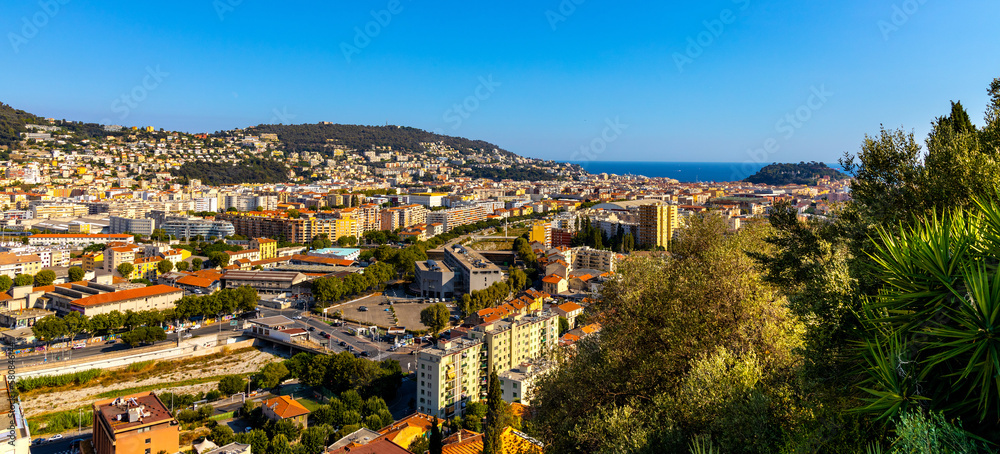 Nice metropolitan view with Colline du Chateau Castle Hill, Mont Boron Mountain, Vielle Ville, Riquier and Port district on French Riviera Azure Coast in France