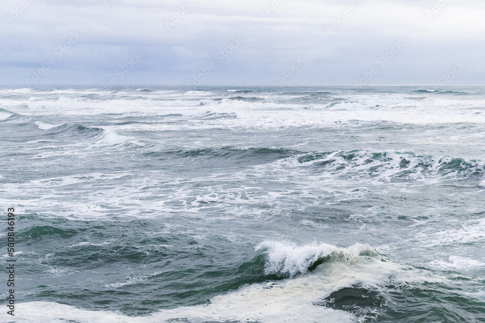 Waves in Pacific Ocean on Cloudy Day in Winter at Columbia River South Jetty Waves in Pacific Ocean on Cloudy Day in Winter at Columbia River South Jetty