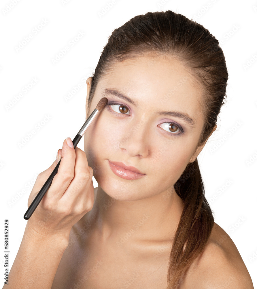 Professional makeup artist doing makeup for girl