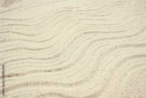 stylish beautiful pattern on the sand of the sea in the summer on the nature