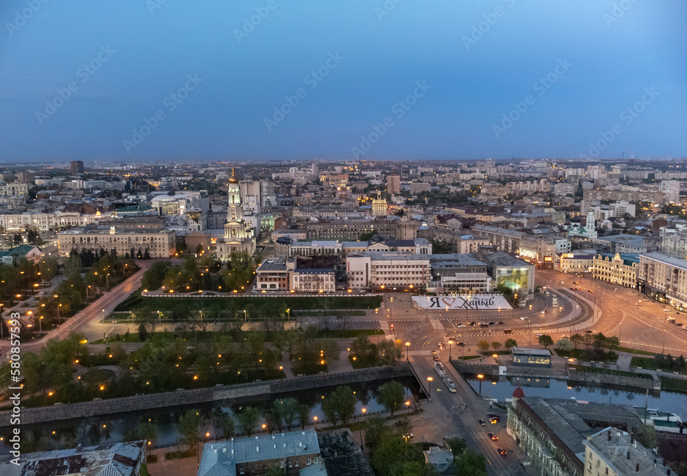 Evening illuminated city aerial . Dormition Cathedral and (I love Kharkiv) sign on square in Kharkiv city downtown, Ukraine