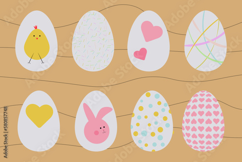 Collection of cute decorative easter eggs with chicken, bunny and other elements.