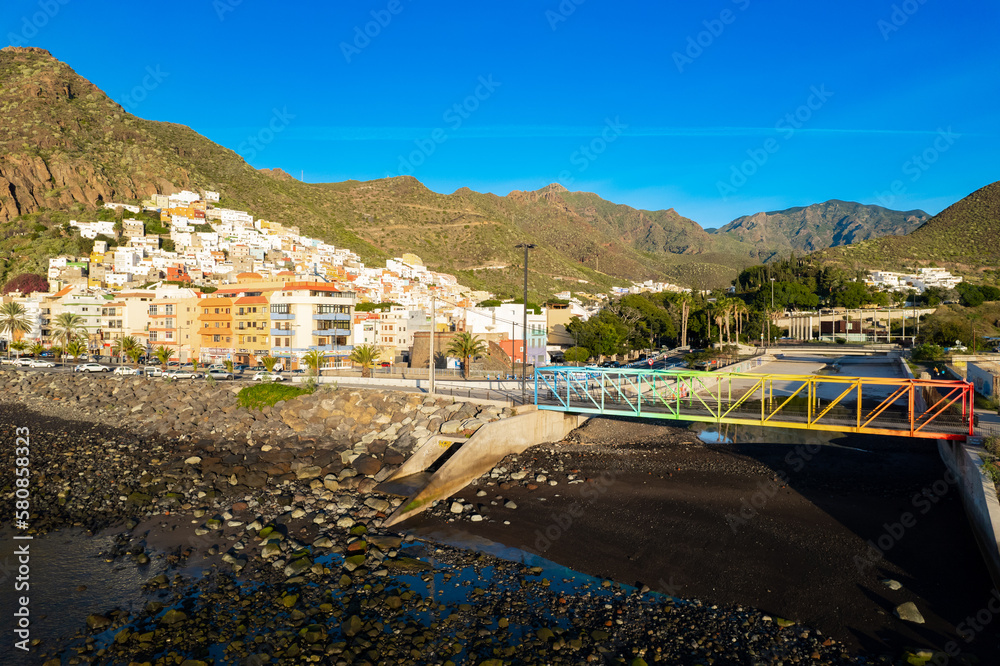 Obraz premium Aerial view above rainbow colored swimming beach - Playa de Las Teresitas - in San Andres Tenerife Canary Islands