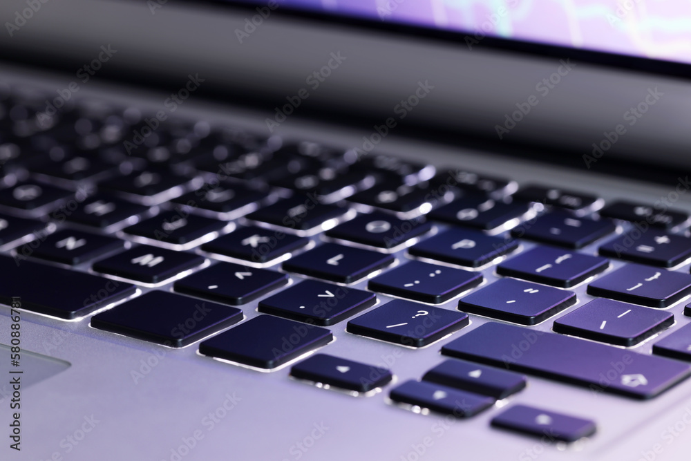 Closeup view of modern laptop keyboard as background Closeup view of modern laptop keyboard as background