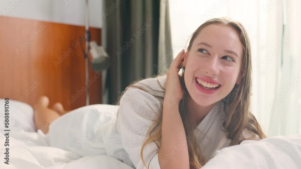 Portrait of Caucasian beautiful woman smile and look at camera in bedroom. Portrait of Caucasian beautiful woman smile and look at camera in bedroom.