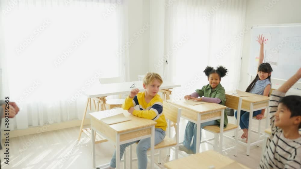 Group of student learn with teacher in classroom at elementary school. Group of student learn with teacher in classroom at elementary school.