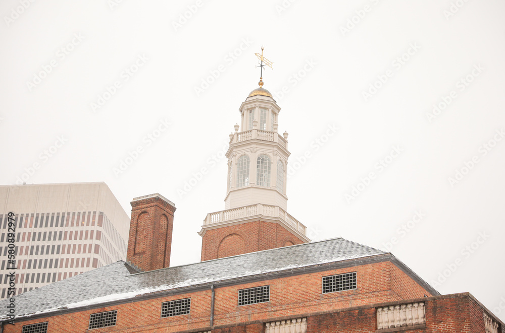 Historic and traditional church architecture showing religious structure in urban downtown city 