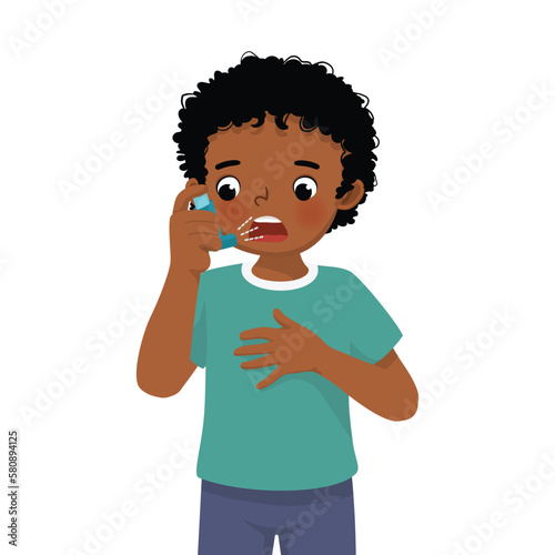 Cute little African boy using asthma inhaler nasal spray bottle to treat allergy asthma attack and breathing treatment