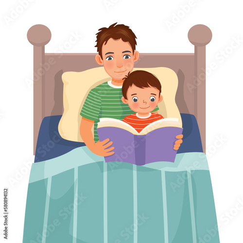 Young father reading bedtime story book to his son in the bed
