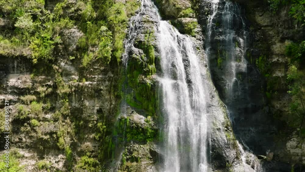 A tropical waterfall in the jungles. Slow motion. Balea Falls in the jungle. Negros, Philippines. A tropical waterfall in the jungles. Slow motion. Balea Falls in the jungle. Negros, Philippines.
