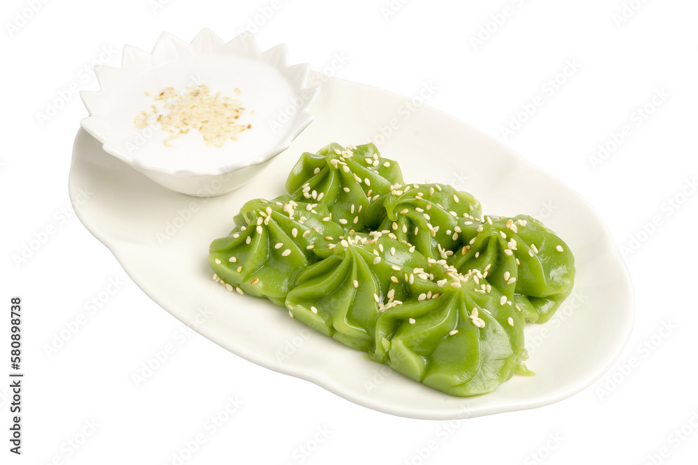 Fresh Pandanus Pudding served with Coconut Cream, Traditional Thai dessert. Fresh Pandanus Pudding served with Coconut Cream, Traditional Thai dessert.