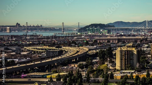 San Francisco city vehicle traffic with the Golden Gate Bridge over the Bay in the background - time lapse