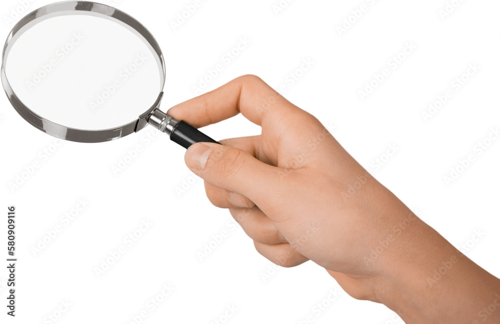 Human hand holds magnifying Glass Human hand holds magnifying Glass