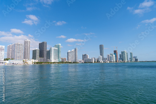 Miami, Florida USA - April 15, 2021: metropolis cityscape of city downtown with skyscrapers and sea