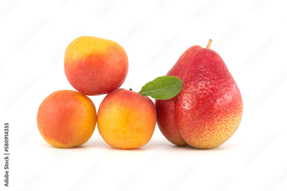 Apricots and multi-colored pear isolated on white Apricots and multi-colored pear isolated on white