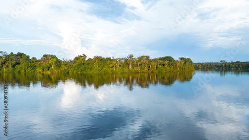 The Nanay River, one of the most important freshwater channels in the Peruvian jungle surrounded by green nature, and is part of the Allpahuayo Mishana Reserve photo