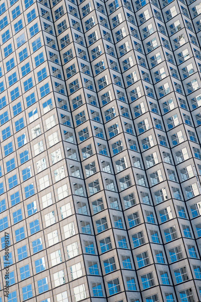 Fototapeta premium geometric multistory building exterior background. building exterior background structure.