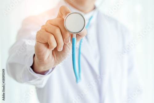 Принти на полотні Doctor hold stethoscope in health care administration Concept and Free copy spac