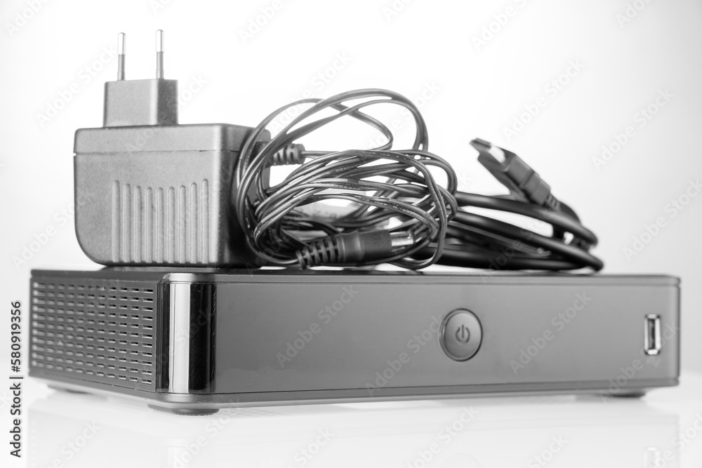 TV settop box prepared for installation, digital TV kit on white