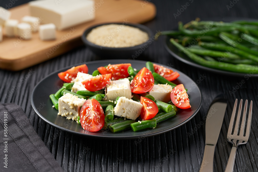 Plate with delicious green beans salad on wooden table, closeup Plate with delicious green beans salad on wooden table, closeup