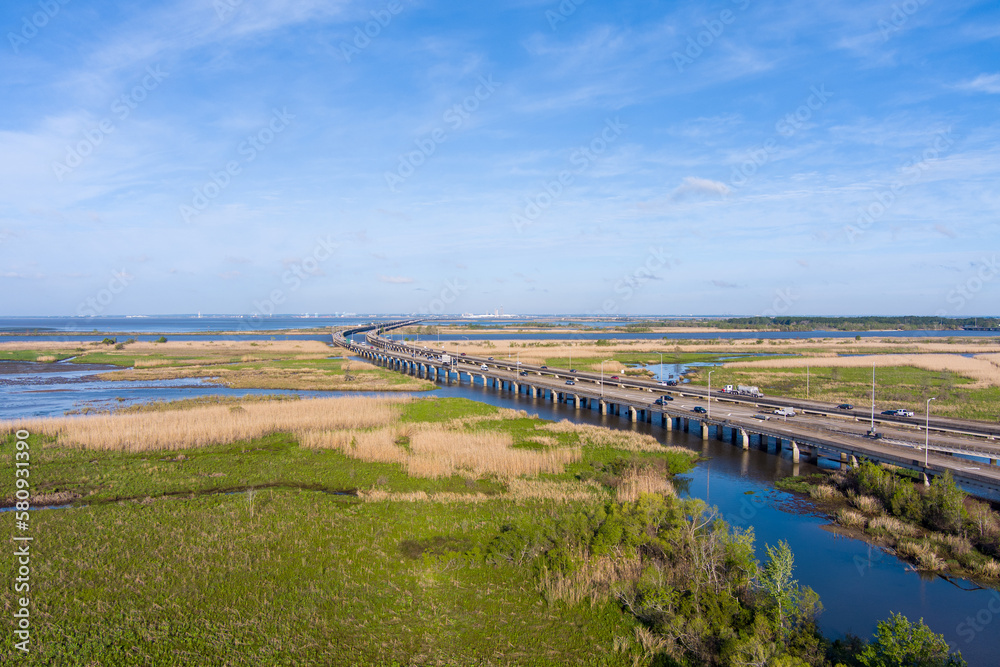 Aerial view of interstate 10 bridge on Mobile Bay in March 2023