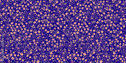 Vintage seamless tiny floral pattern. Blue background with small flowers. Design for wallpaper, clothing, packaging, fabric, cover, textiles