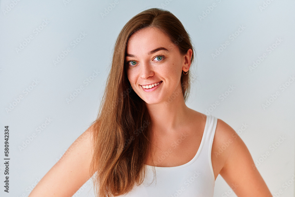 Portrait of young caucasian woman with natural beauty on a white background Portrait of young caucasian woman with natural beauty on a white background
