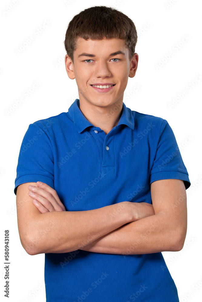 Teenage male standing with his arms folded in front of him Teenage male standing with his arms folded in front of him