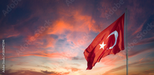 Turkish flag. Turkey national flag. Turkish flag at sunset. Empty space for text. Copy space