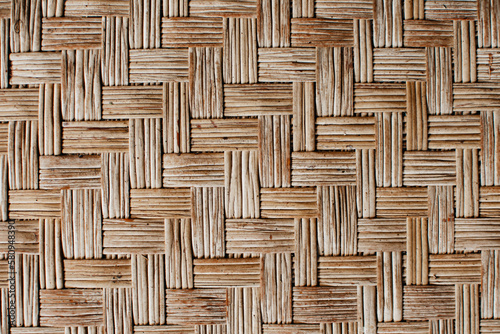 Textures with wooden boards  bamboo sticks and wicker. Bamboo plank wicker texture background. 