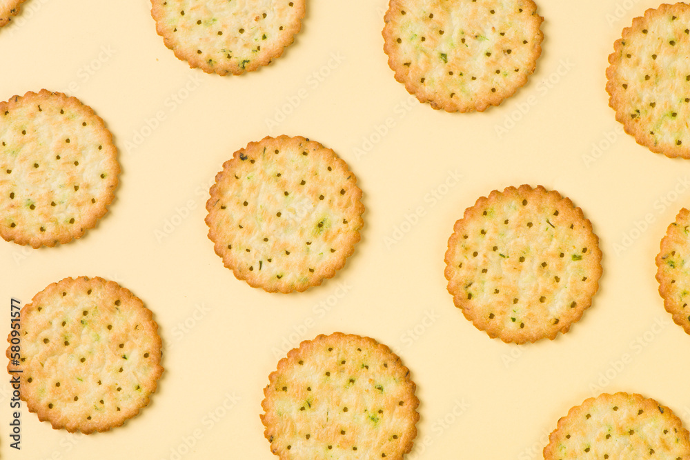 Group of tasty crackers or biscuit on yellow background.