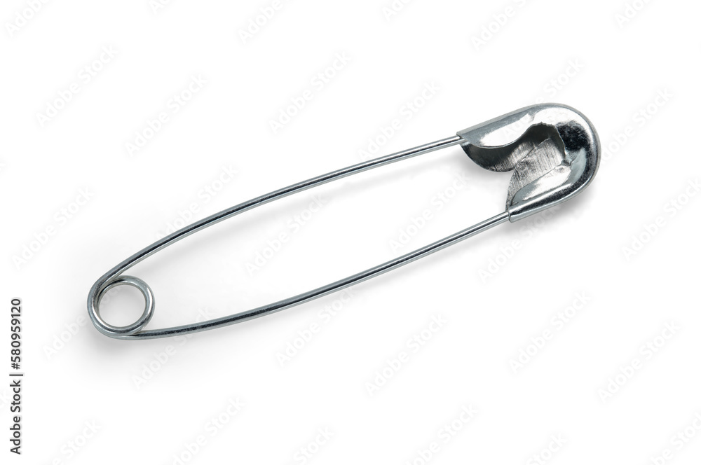 safety pin brooch metallic isolated on white background. This has clipping path. safety pin brooch metallic isolated on white background. This has clipping path.