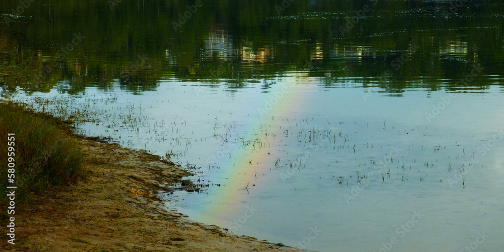 Rainbow reflection on Water Rainbow reflection on Water