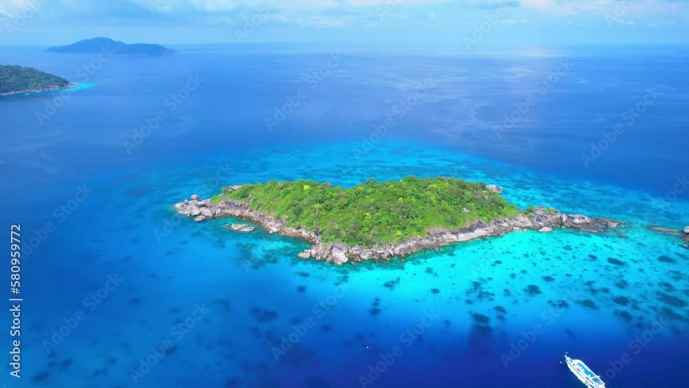 aerial view of Islands, the Andaman Sea, with natural blue waters, tropical seas, impressive views of the island's beauty. The island is shaped like a heart. aerial view of Islands, the Andaman Sea, with natural blue waters, tropical seas, impressive views of the island's beauty. The island is shaped like a heart.